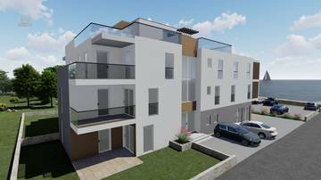 Moderne Neubauwohnung im obersten Stockwerk mit Dachterrasse - 1. Reihe zum Strand