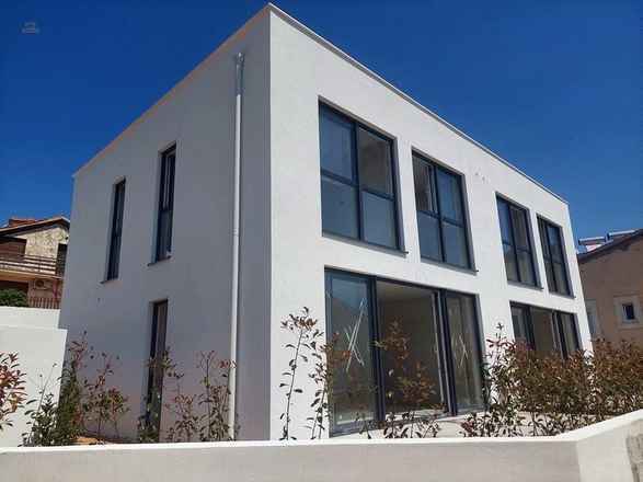 Moderne Doppelhaushälften mit Dachterrasse und Meerblick
