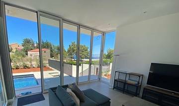 Thumbnail von Villa moderna con piscina cerca del mar