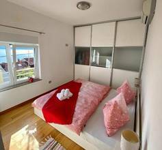 Thumbnail von Haus mit drei Wohnungen und schönem Meerblick in Lovran, Kvarner Bucht