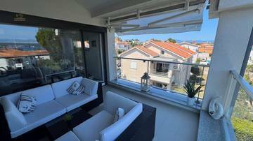 Thumbnail von Appartement mit Meerblick + Studio mit Garten