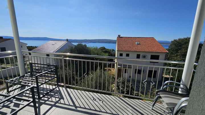 Dachgeschosswohnung mit Panorama-Meerblick