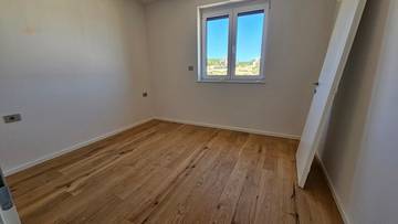 Thumbnail von Attraktives Neubau-Appartement  im 2. OG + Studio mit Garten im Erdgeschoss