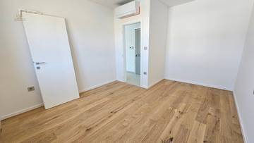 Thumbnail von Attraktives Neubau-Appartement  im 2. OG + Studio mit Garten im Erdgeschoss