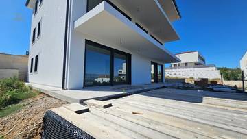 Thumbnail von Attraktives Neubau-Appartement  im 1. OG + kleinere Ferienwohnung mit Garten im Erdgeschoss