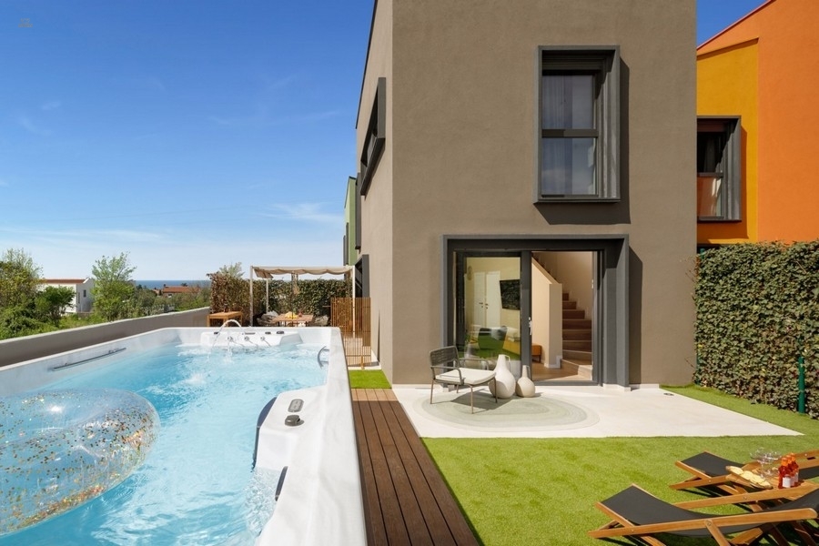 Reihenendhaus mit Garten und Meerblick