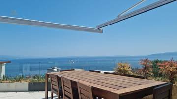 Thumbnail von Luxuriöses Penthouse mit privater Dachterrasse und traumhaftem Meerblick