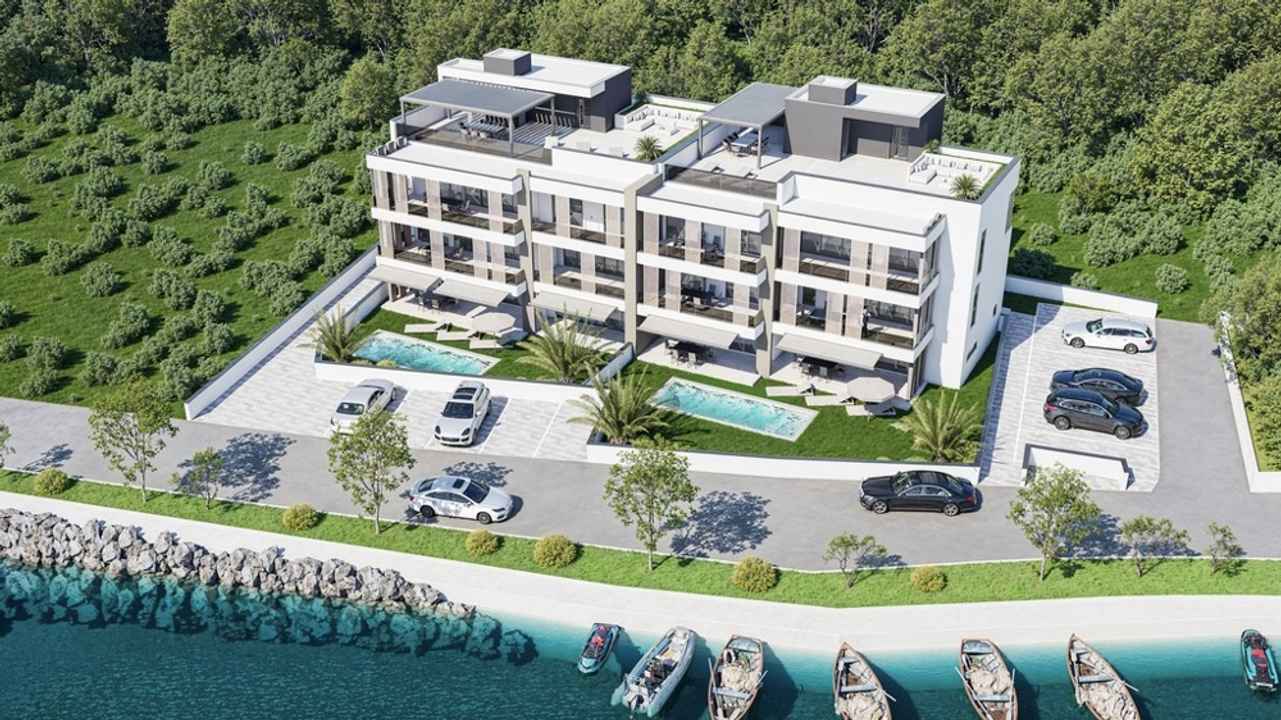 Modernes Penthouse mit Dachterrasse in der 1. Reihe zum Meer