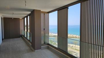 Thumbnail von Modernes Penthouse mit Dachterrasse in der 1. Reihe zum Meer