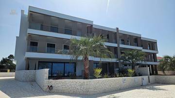 Thumbnail von Modernes Penthouse mit Dachterrasse in der 1. Reihe zum Meer