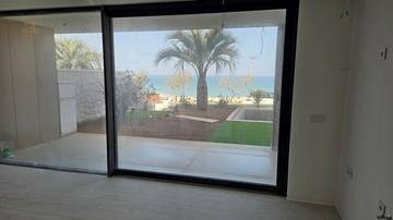 Thumbnail von Exklusive Erdgeschosswohnung mit Garten und Pool - 1. Reihe zum Meer