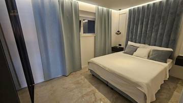 Thumbnail von Moderne Erdgeschosswohnung mit Pool und Garten