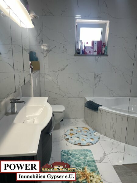 Thumbnail von Neuwertiger Bungalow in unschlagbarer Lage, zentral, umgeben von Grünland in Bachnähe!