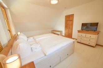 Thumbnail von Holz trifft Hochufer: 4 strandnahe Wohneinheiten - Meeresrauschen gratis!