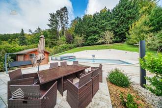Thumbnail von Luxuriöse Villa im Wienerwald – Beheizter Salzwasserpool, Gartenparadies & Premium-Parkmöglichkeiten
