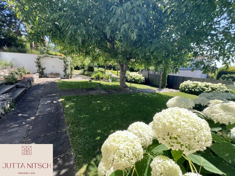 Thumbnail von Exquisites Terrassenhaus mit max. 3 Wohneinheiten in Eisenstadt, separates Baugrundstück – Ihr neues Zuhause mit Traumgarten, Naturpool und Weitblick!