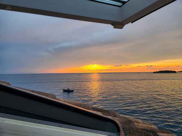 Wohnung im Dachgeschoss mit wunderschönem Meerblick