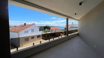 Modernes Neubau-Appartement mit Meerblick