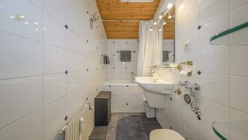 Thumbnail von Dachgeschosswohnung an der Skipiste mit Kaiserblick