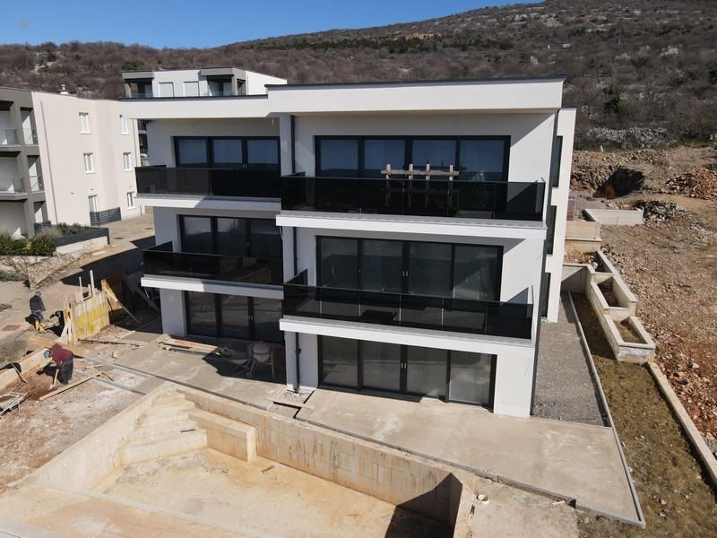 Thumbnail von Modernes Neubau-Appartement mit wunderschönem Meerblick, Garten und privatem Pool