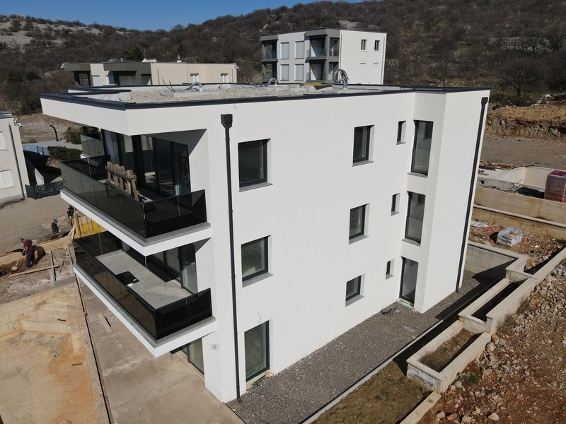Thumbnail von Modernes Neubau-Appartement mit wunderschönem Meerblick, Garten und privatem Pool