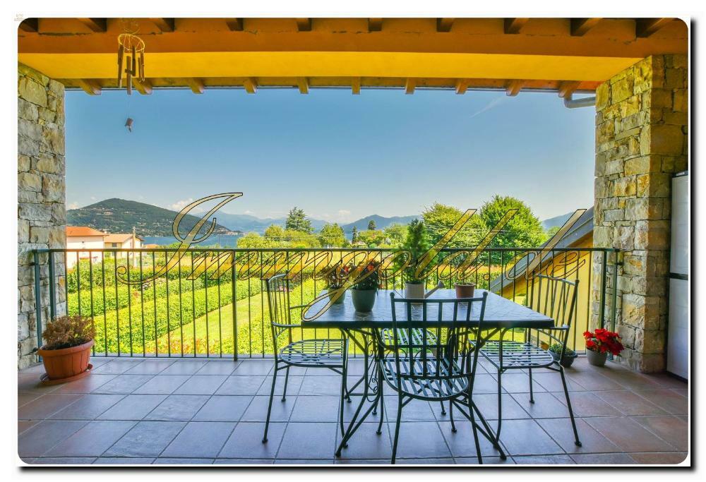 Thumbnail von Immogold Lago Maggiore, attraktive Maisonette in moderner Wohnanlage mit beeindruckendem Seeblick und exklusivem Gemeinschaftspool – ideal für alle, die Komfort, Ruhe und Lebensqualität schätzen.
