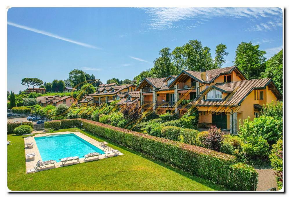 Thumbnail von Immogold Lago Maggiore, attraktive Maisonette in moderner Wohnanlage mit beeindruckendem Seeblick und exklusivem Gemeinschaftspool – ideal für alle, die Komfort, Ruhe und Lebensqualität schätzen.