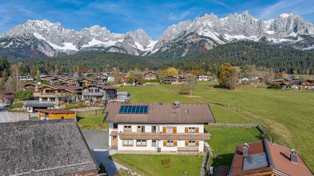 Bytový dům s rekreačním bydlištěm na špičkové lokalitě