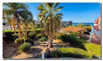 Thumbnail von Immogold Sizilien beeindruckendes, großes Doppelhaus ganz nahe am Meer mit sechs Schlafzimmern, Dachterrasse und mediterranen Gärten