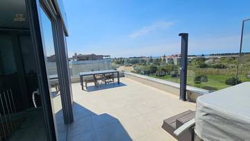 Penthouse mit Dachterrasse und Meerblick