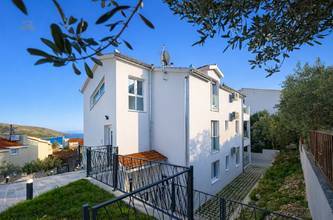 Neue Appartements in EG, OG und DG nahe dem Strand