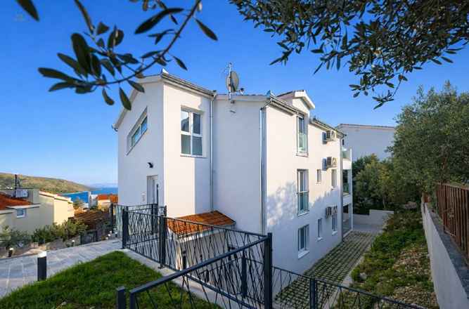 Neue Appartements in EG, OG und DG nahe dem Strand