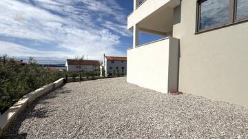 Thumbnail von Moderne Erdgeschosswohnung mit Garten und Meerblick