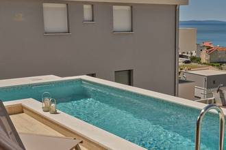 Thumbnail von Exklusive Wohnung auf drei Ebenen in Luxusvilla mit Pool, Meerblick und Dachterrasse