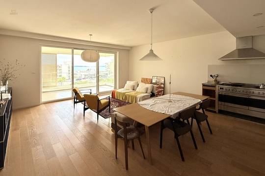 Moderne Neubauwohnung mit Meerblick und Garage in Toplage