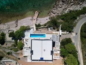 Thumbnail von Moderne Luxusvilla in erster Reihe am Meer mit Infinity-Pool und direktem Strandzugang