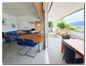 Thumbnail von Modern renoviertes, exklusives, ebenerdiges Einfamilienhaus mit traumhaftem Seeblick in sonniger Ruhelage