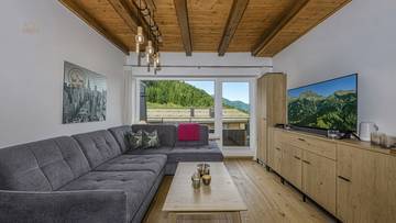 Thumbnail von Dachgeschosswohnung an der Skipiste mit Kaiserblick