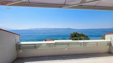 Neubauwohnung im Dachgeschoss direkt am Meer