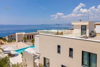 Thumbnail von Moderne Villa mit beheiztem Pool, Meerblick und Dachterrasse
