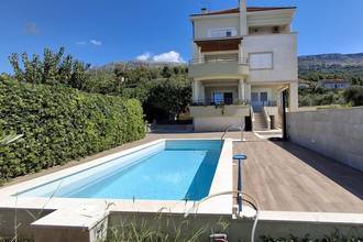 Thumbnail von Haus mit Swimmingpool und Meerblick in Strandnähe