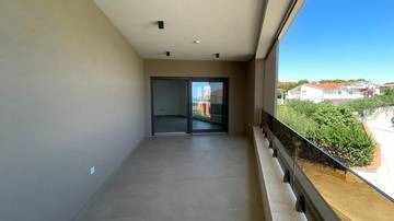 Thumbnail von Neubauwohnung mit Meerblick, Terrasse und Aufzug, 50 Meter zum Strand