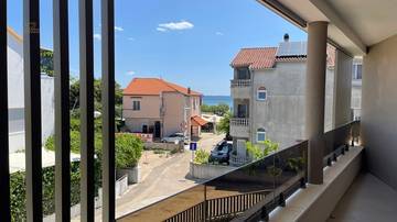 Thumbnail von Neubauwohnung mit Meerblick, Terrasse und Aufzug, 50 Meter zum Strand