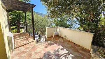 Thumbnail von Doppelhaushälfte in erster Reihe zum Meer mit Bootsanleger (Nutzung), Garten und Garage