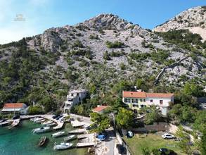 Thumbnail von Doppelhaushälfte in erster Reihe zum Meer mit Bootsanleger (Nutzung), Garten und Garage