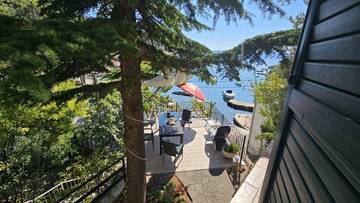 Thumbnail von Doppelhaushälfte in erster Reihe zum Meer mit Bootsanleger (Nutzung), Garten und Garage