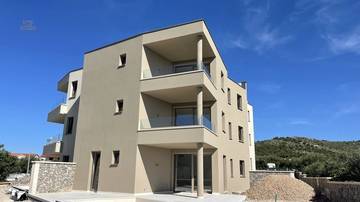 Thumbnail von Neubauwohnung mit Meerblick, drei Schlafzimmern und überdachter Terrasse nahe Strand