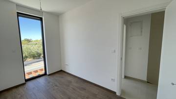Thumbnail von Neubau-Doppelhaushälfte mit Meerblick, Garten und zwei Stellplätzen
