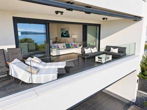 Thumbnail von Wohnung mit überdachter Terrasse und Panoramablick aufs Meer