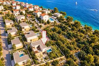Thumbnail von Neubauvilla mit Pool, Garage und Meerblick